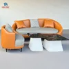 "Sofa da cong lounge màu camel xám với thiết kế bo mềm hiện đại tại showroom nội thất Thịnh Phát Đà Nẵng