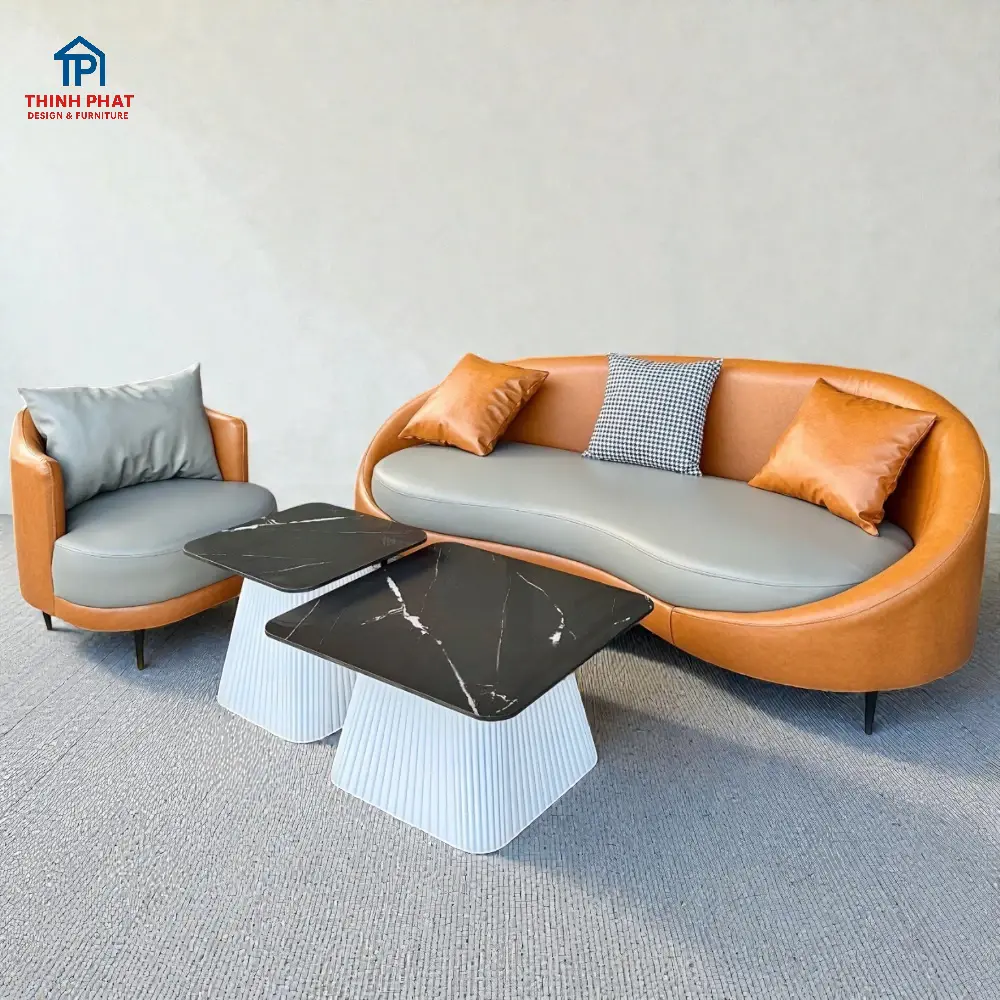 Mẫu sofa da bo cong màu camel phối đệm xám phong cách hiện đại