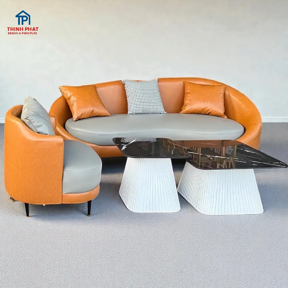 "Sofa da cong lounge màu camel xám với thiết kế bo mềm hiện đại tại showroom nội thất Thịnh Phát Đà Nẵng