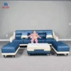 Sofa da Carola màu xanh navy phối kem phong cách hiện đại cho phòng khách gia đình tại Thịnh Phát Đà Nẵng