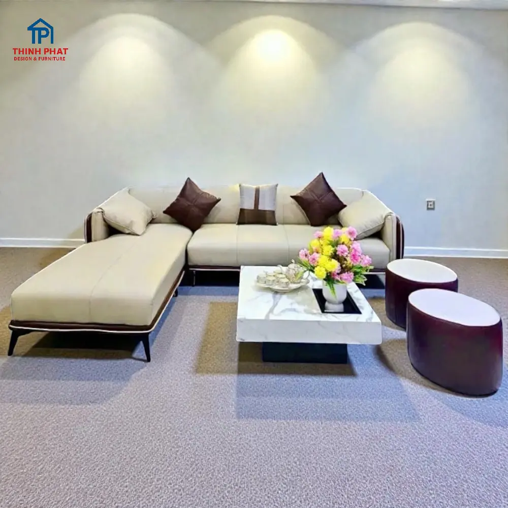 Sofa Góc Da Bo Cong 2 Tone Kem Nâu bàn trà trắng tại Đà Nẵng