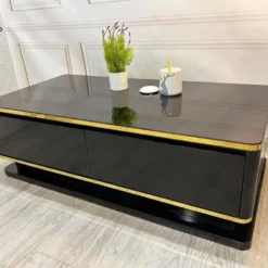 Bàn sofa chữ nhật chân bệt màu đen viền vàng hai ngăn kéo tại showroom bàn trà ở Đà Nẵng