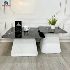 Góc chụp thực tế Bàn trà couple mặt kính đen chân trụ trắng với màu sắc và kiểu chân rõ nét tại Nội thất Thịnh Phát Đà Nẵng