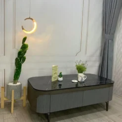 Ảnh chi tiết Bàn sofa đá đen thân xám chân cao cho khách xem dáng bàn và mặt bàn tại Nội thất Thịnh Phát Đà Nẵng