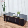 Bàn trà gương đen hai ngăn kéo viền vàng đặt cạnh sofa, phù hợp tham khảo trước khi chọn mua