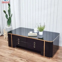 Bàn trà gương đen hai ngăn kéo viền vàng đặt cạnh sofa, phù hợp tham khảo trước khi chọn mua