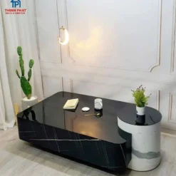 Góc chụp thực tế Bàn trà khoét bán nguyệt thân đen trụ tròn với màu sắc và kiểu chân rõ nét tại Nội thất Thịnh Phát Đà Nẵng