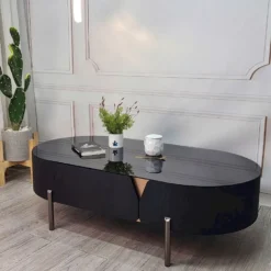 Ảnh chi tiết Bàn trà oval đen chân cao thanh mảnh cho khách xem dáng bàn và mặt bàn tại 466-472 Ngô Quyền Đà Nẵng