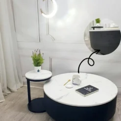Ảnh chi tiết Bàn trà tròn trắng kèm bàn nhỏ tay cong cho khách xem dáng bàn và mặt bàn tại Nội thất Thịnh Phát Đà Nẵng